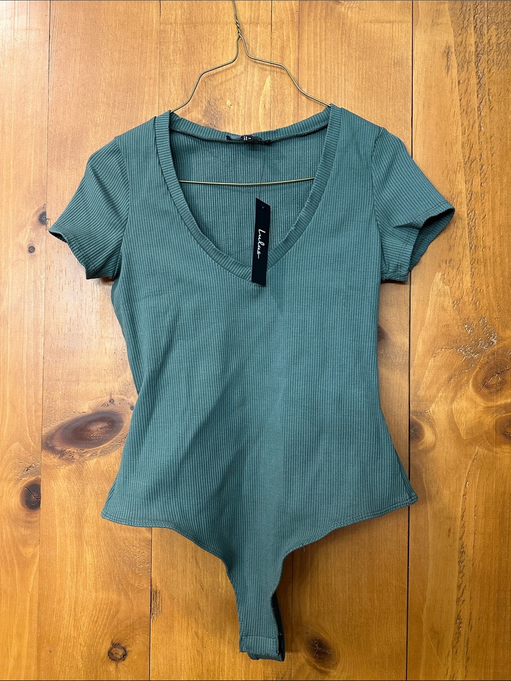 Lulu's Ribbed V-Neck Short Sleeve Bodysuit